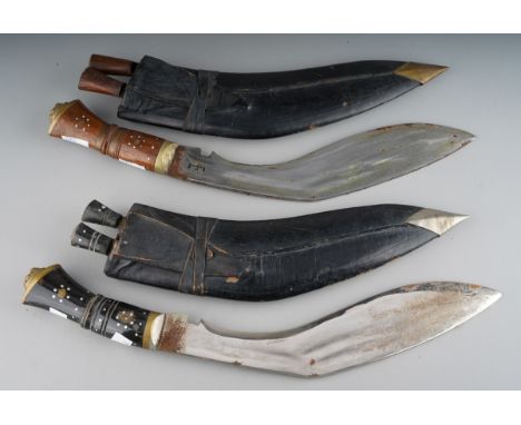 Two 20th century kukri, both in leather scabbards, one blade stamped engraved, the other stamped I.C.E. (2)