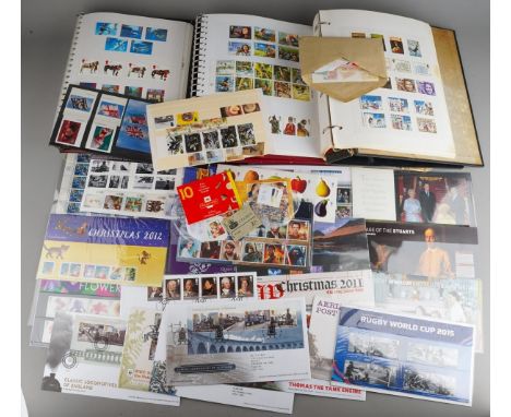 A collection of mostly QEII presentation pack and pictorial stamps, in albums, first day covers and packs, includes a small q