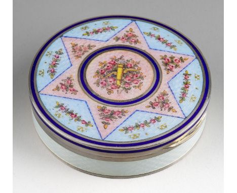 A 20th Century white metal and enamel circular box, the  hinged cover with guilloche enamel and floral decotation, the side i