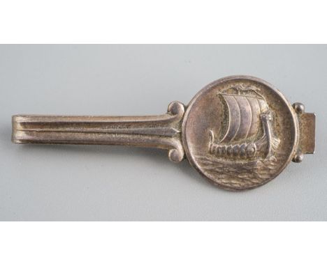 A Georg Jensen Viking ship tie clip, fully marked to back. Approx. 5.3 cm long