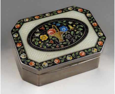 An early 20th century German silver and enamel shaped rectangular box, the hinged lid white guilloche enamelled and cloisonne