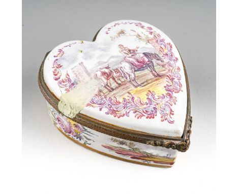 A 19th century heart shaped enamel box, the cover painted with a rural landscape including a figure on horseback, the horse d
