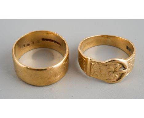 Two 9ct gold rings including a buckle ring and a wedding band, gross total weight approx. 7.7g, UK size for both N
