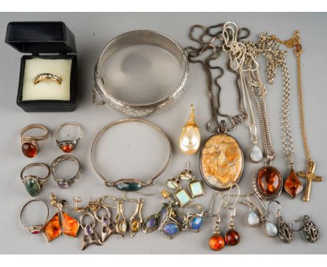 A small quantity of gold and silver jewellery, including a 9ct gold crucifix on a chain stamped 9ct with base metal link at c