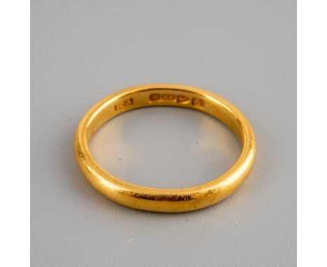 A 22 carat wedding band, ring size M, band width 2mm, slightly misshapen, fully hallmarked, 4.8 grams
