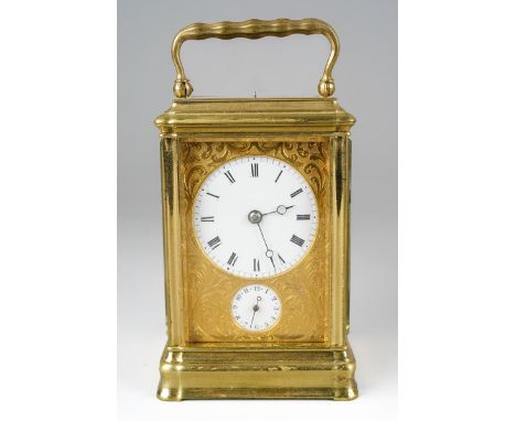 A late 19th Century French brass and bevelled glass carriage clock with alarm, the white enamel Roman dial and subsidiary Ara