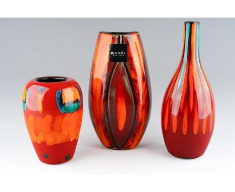 A collection of three various Modern Poole Pottery vases, abstract decoration on red grounds, various shapes, approx 26cm, 29