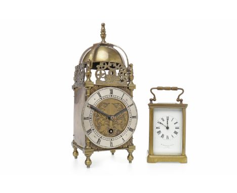 EARLY 20TH CENTURY LANTERN CLOCKthe one train, 30 hour movement by Empire, numbered 264, the silvered chapter ring with Roman