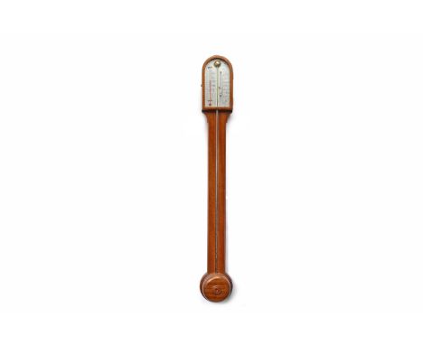 MAHOGANY CASED STICK BAROMETER OF REGENCY DESIGNby Short & Mason, the arched pediment with silvered dial, the barometer next 