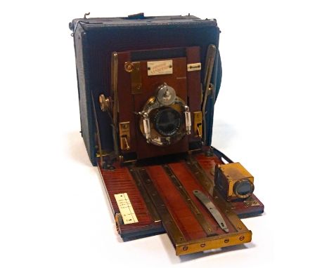 EDWARDIAN 'JUNIOR SANDERSON' PLATE CAMERAwith f-8 Series II lens, focus 7 1/2 " by Bausch & Lomb optical Co., mahogany, brass