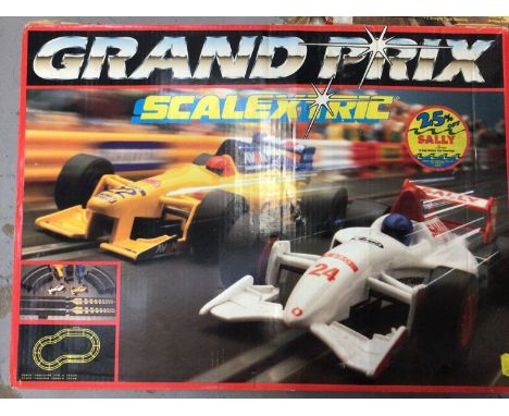 Two 1980's slot car sets together with a scalextric set (3)