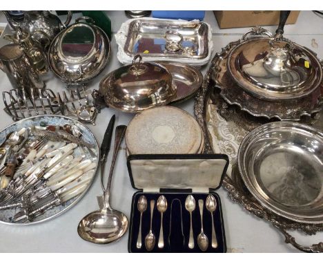 Silver plated ware including tureens, tea and coffee pots, toast racks, mother of pearl handled cake forks, other flat ware, 