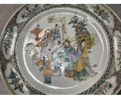 Pair of Chinese Qing famille verte dishes, 23cm diameterBoth with some enamel and gilt wear. One with some small rim chips. 2