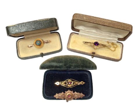 Four Late Victorian/ Edwardian 9ct gold gem set and seed pearl bar brooches, within three antique jewellery boxesTotal weight