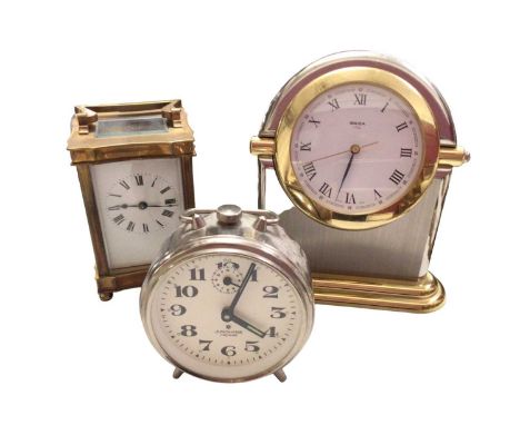 Swiza '1904' stainelss steel and brass mantle clock with rotating dial, brass cased mantle clock and one other time piece (3)