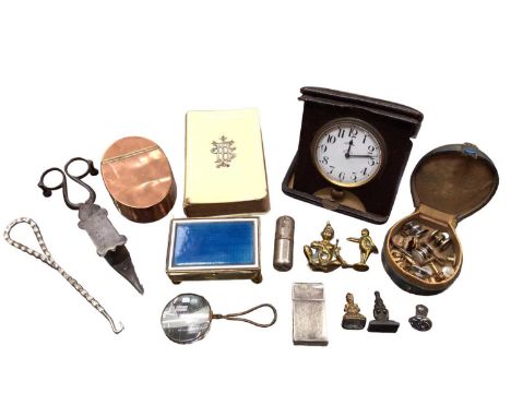 Early 20th century leather cased travelling clock, together with a copper snuff box, candle snuffer, seals, button hook and s