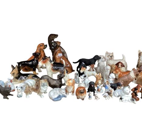 Collection of various dog ornaments, various manufacturers including Coopercraft and Sylvia's - 1 shelf