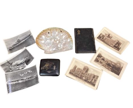 Carved mother of pearl shell with elephant decoration, cigarette case, travel chess set and postcards