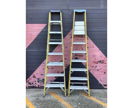 Youngman 8 tread fibreglass step ladder, together with another 8 tread fibreglass step ladder.