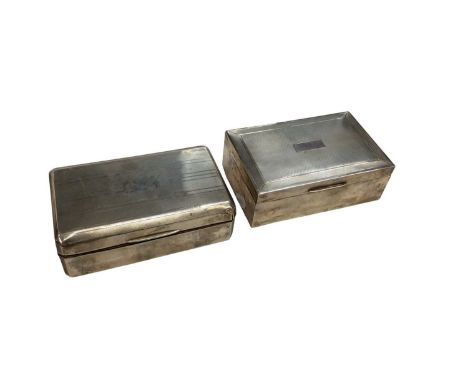 Two silver mounted cigarette boxes with engine turned decoration