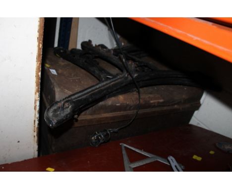 A LARGE TIN TRUNK + TWO CAST BENCH LEGS