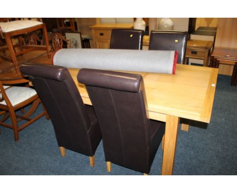 A MODERN LIGHT OAK EXTENDING DINING TABLE + FOUR CHAIRS