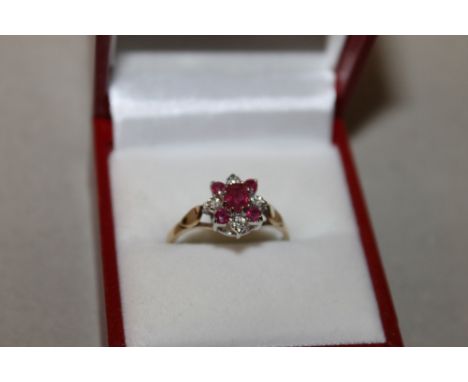 A 9CT GOLD RUBY DRESS RING