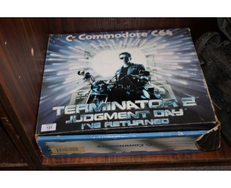 A BOXED COMMODORE C64 CONSOLE + GAMES