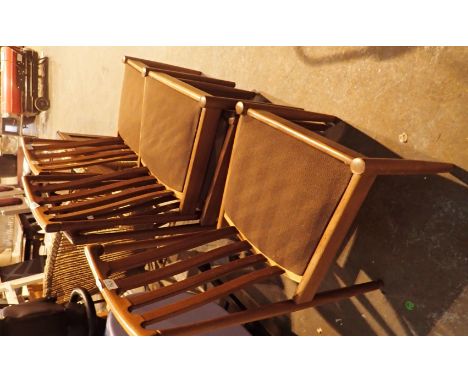 Six teak dining chairs c1970 with an upholstered pouffe