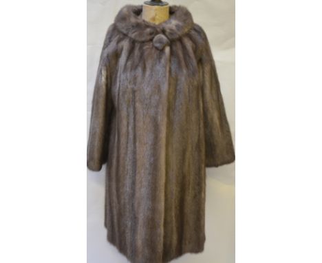 A 1950s dark smokey grey mink coat with cowl neck and single button fastening, 50 cm across chest Condition Report Good worn 