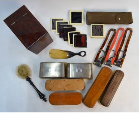 A pair of engine-turned silver-backed hairbrushes, Birmingham 1935/36, to/w various clothes brushes, shoe horn, two simulated