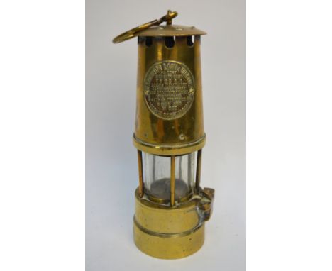 A brass miner's safety lamp, the Patent Utility Lamp Type A.1 by The Protector Lamp & Lighting Co. Ltd., Eccles