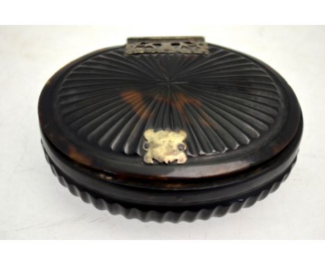 A 18th century continental tortoiseshell oval snuff box with ornate white metal hinges, 9 cm wide Condition Report Lid missin