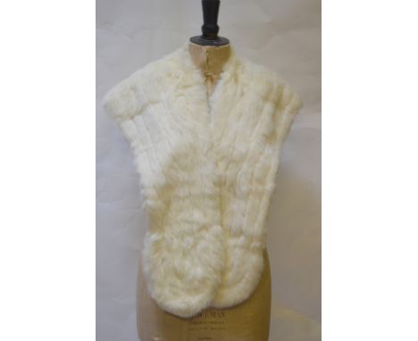 A vintage cream fur evening cape retailed by Packhards, Salisbury/Bournemouth, to/w a white fur evening stole (2) Condition R
