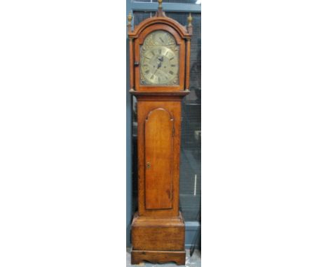 Thomas Wood, London, a late 18th/19th century oak longcase clock,the 8-day movement with arched brass and silvered dial, the 