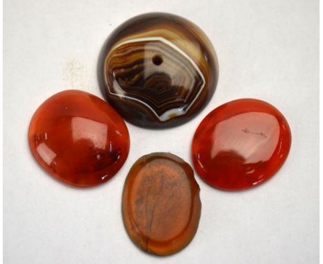 A set of six horn buttons, relief-carved with hounds' heads, to/w a mother-of-pearl button, an agate boss and three intaglio-
