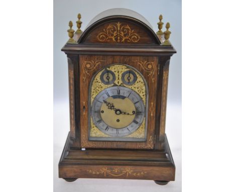 A Victorian satinwood inlaid rosewood bracket clock, the 8-day triple chain fusee movement quarter striking on eight bells an