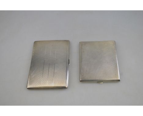 Two heavy quality engine-turned silver cigarette cases, Birmingham 1938/45, 11.5 oz total 