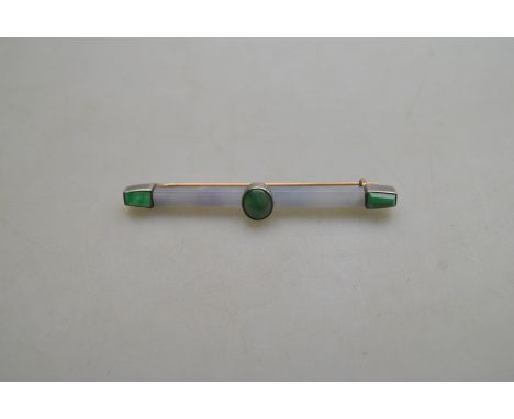 A jade bar brooch, grey, blue and green jade, yellow gold and silver set