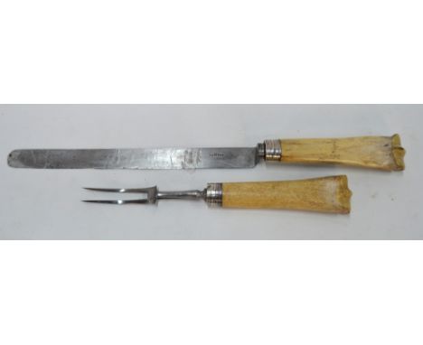Horse racing - An unusual and large ham-carving knife and fork with black steel blade and electroplated banded ferrules, the 