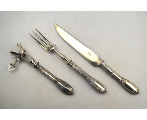 A French carving knife and fork with ham-bone holder, with .950 grade loaded handles