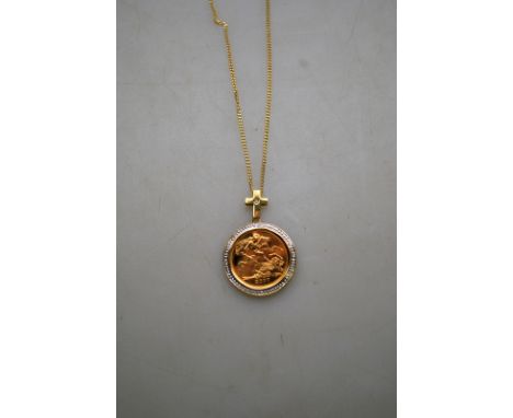 A 2007 digitally mastered half sovereign in 9ct yellow and white gold mount set with four small diamonds, engraved on the edg