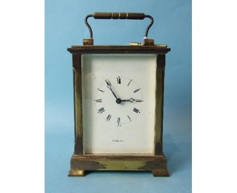 A 20th century brass carriage clock, the movement marked Made in France, striking on a gong, the dial with Roman numerals mar