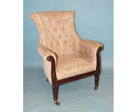 A good-quality George IV rosewood armchair, with shaped button back, upholstered seat and arms, and carved frame, on carved a