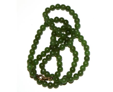 A small jade bead necklace