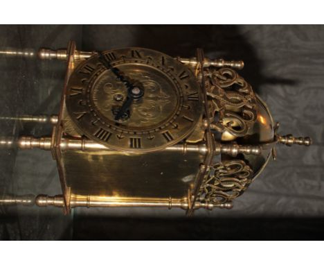 A Smiths brass timepiece in the form of a lantern clock, 17.5cm high