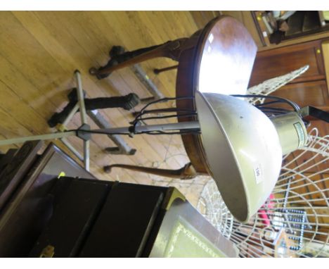 A pair of Photax 11" reflector portrait lights, on tripod bases 