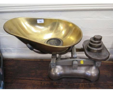 A brass and alloy set of grocer's scales with Avery weights