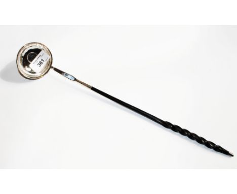 A silver punch ladle, approx 1875