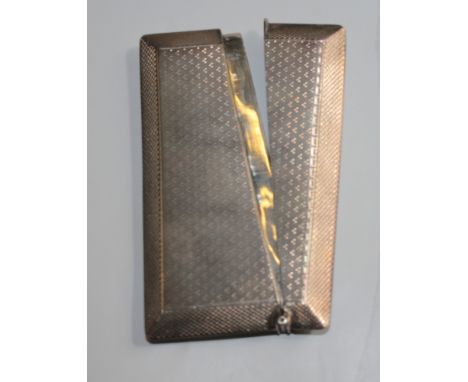 A silver card case with engine turned decoration, Chester 1936